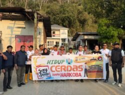 Polda Sultra, Polresta Kendari dan BNN Pasang Spanduk Himbauan Bebas Narkoba di Kampung Salo